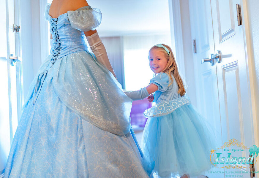 A princess visiting a child at a hotel celebration